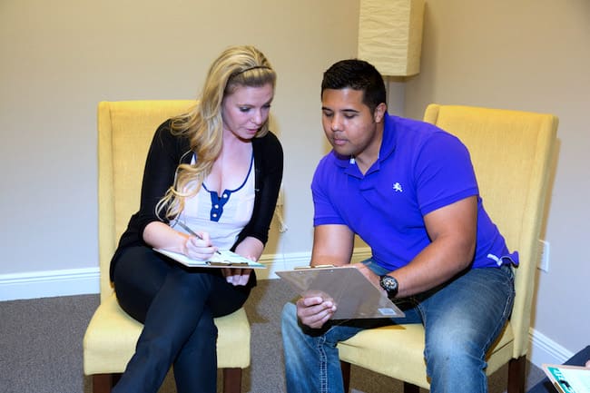 Therapist and parent conducting a parenting consultation session