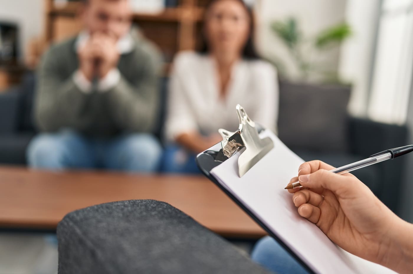Therapist and parent conducting a parenting consultation session