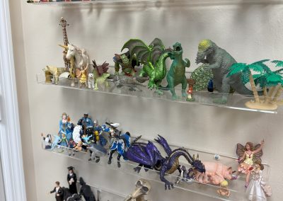 IMG_8367 Fort Myers Florida shelving of characters and figurines for use in play therapy sessions
