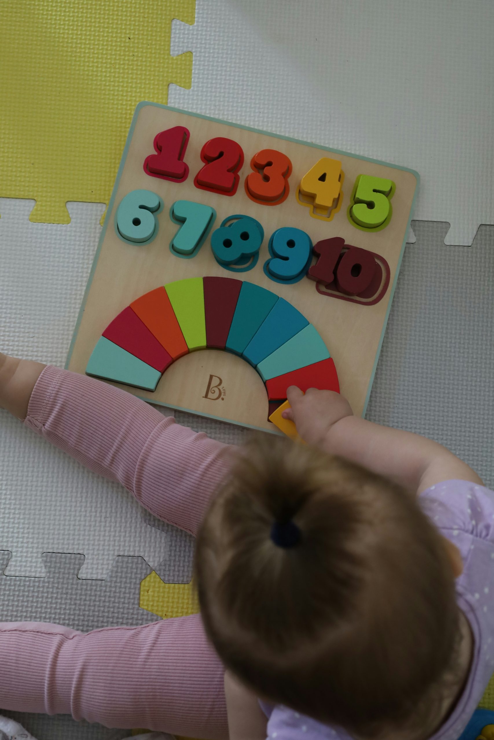 child playing with puzzle child counseling session